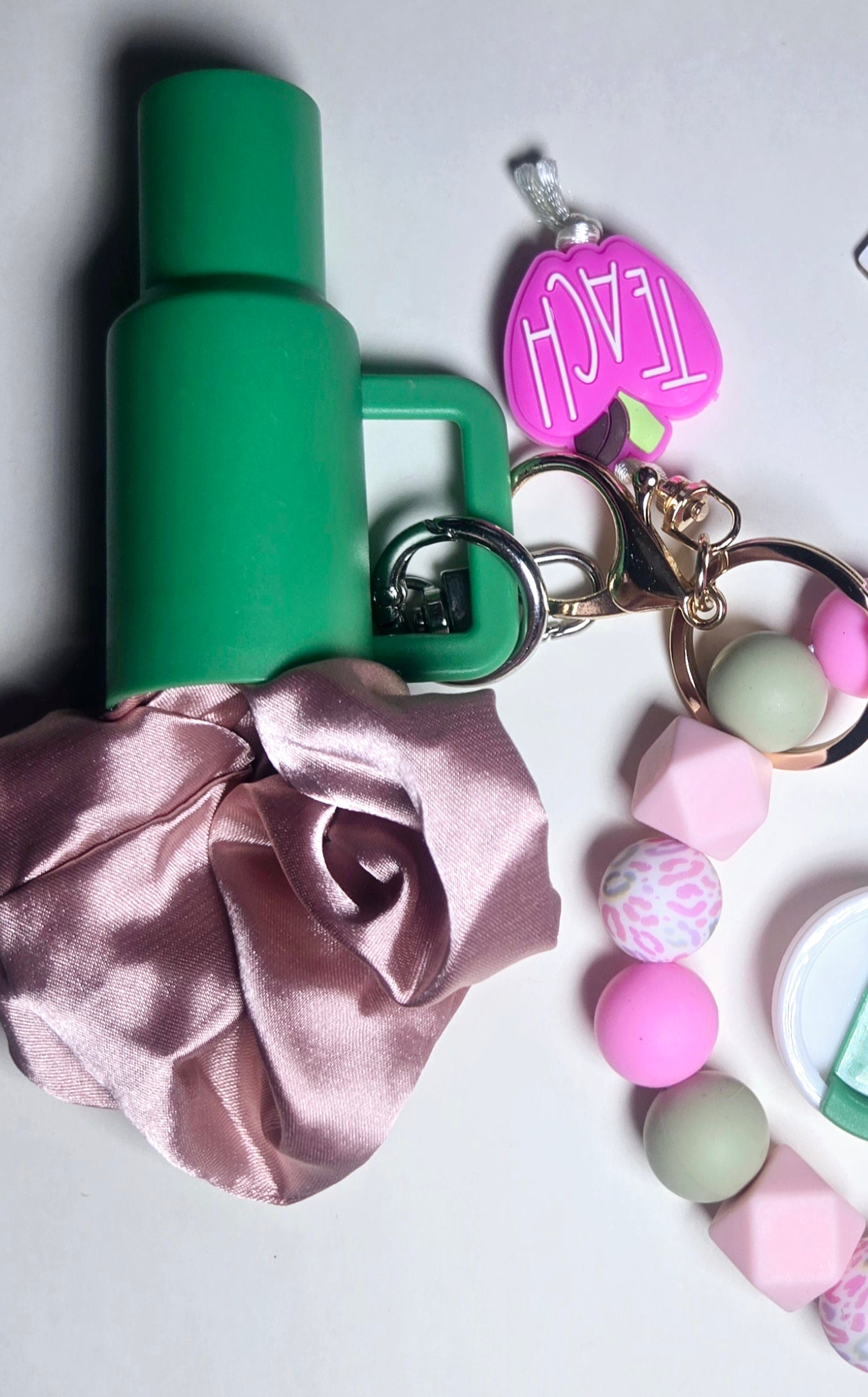 Hollowed out tumbler keychain, TRENDY BEADED Bracelet keychain, and Lip OiL!!