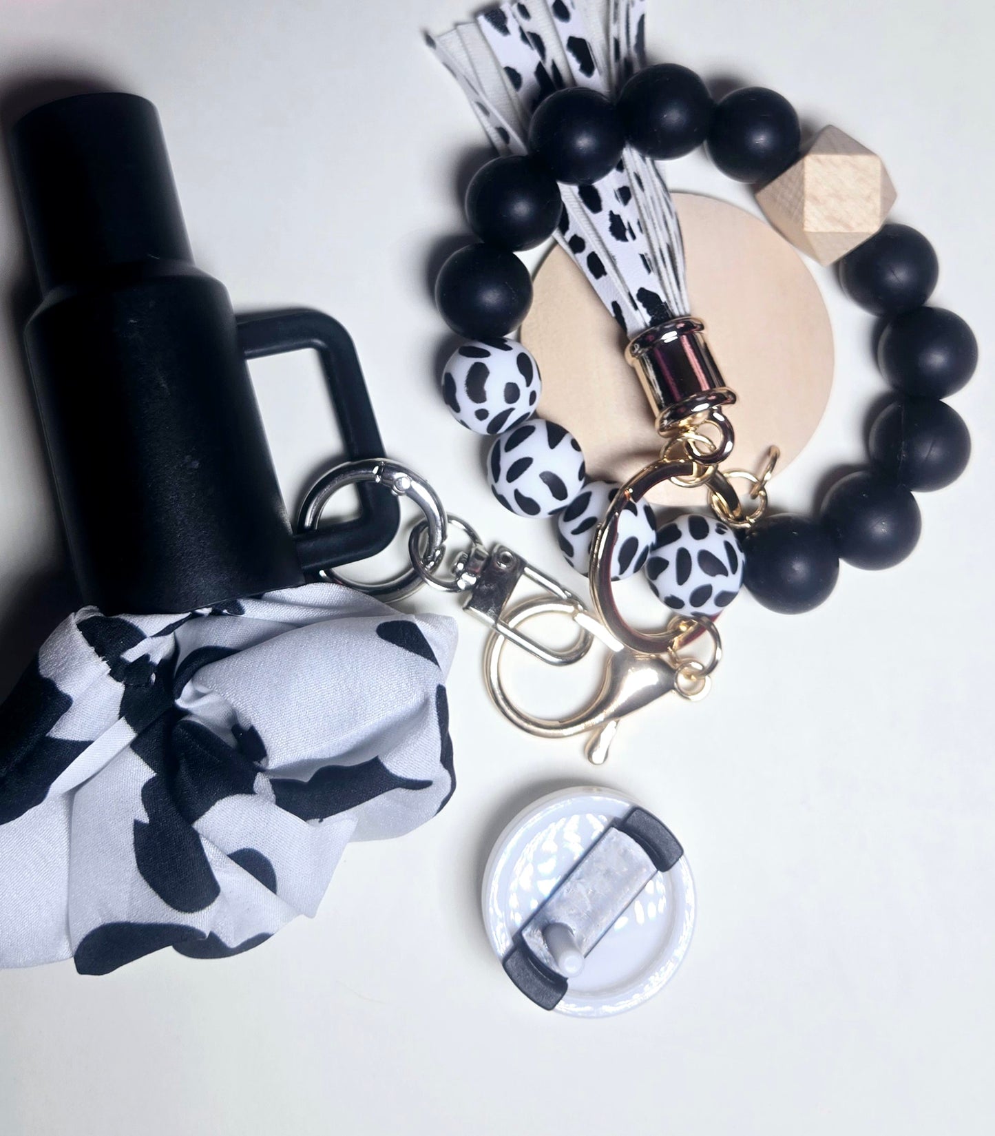 Hollowed out tumbler keychain, TRENDY BEADED Bracelet keychain, and Lip OiL!!