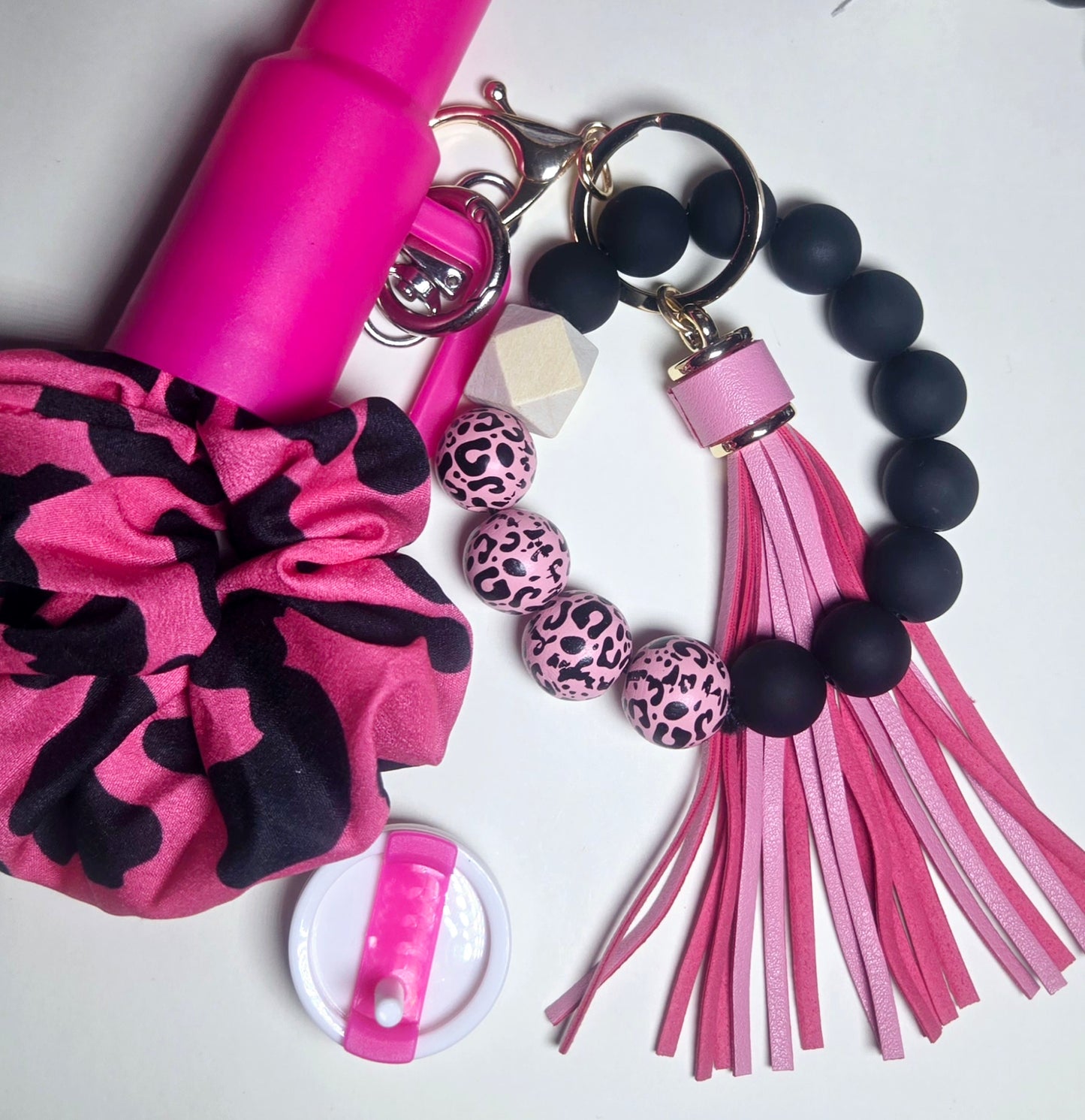 Hollowed out tumbler keychain, TRENDY BEADED Bracelet keychain, and Lip OiL!!