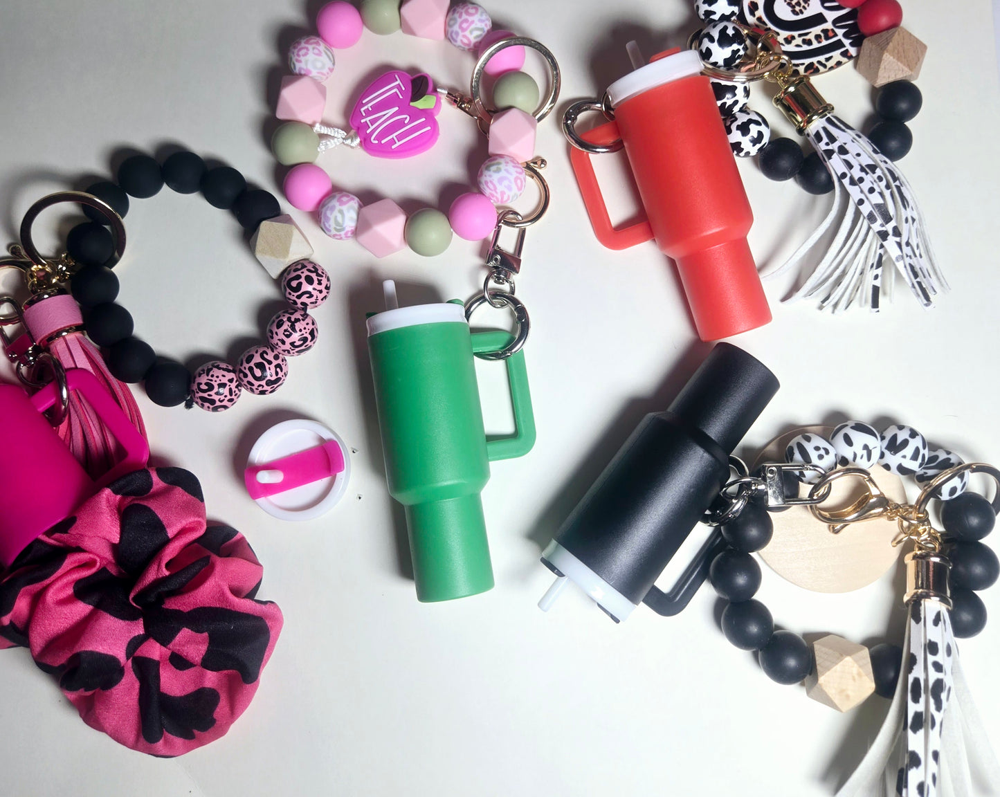 Hollowed out tumbler keychain, TRENDY BEADED Bracelet keychain, and Lip OiL!!