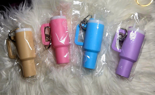 Hollowed out tumbler keychain, TRENDY BEADED Bracelet keychain, and Lip OiL!!