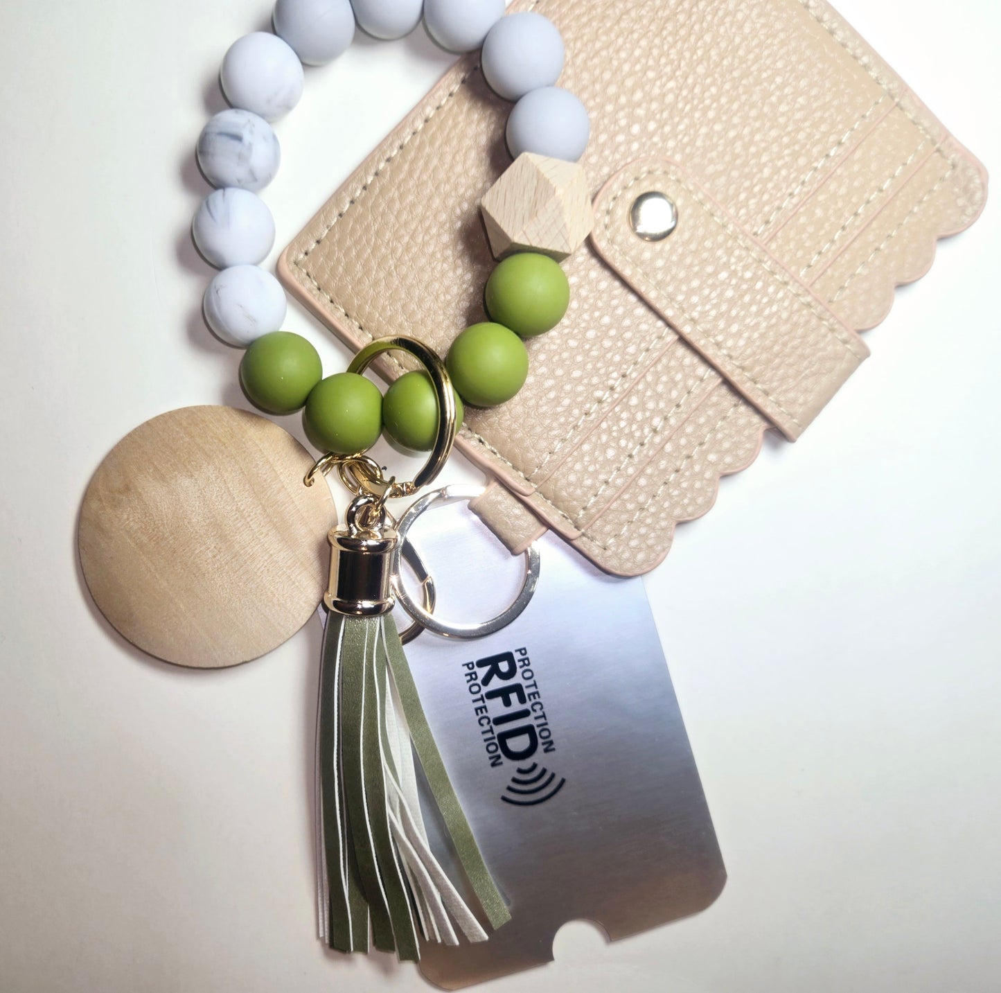 Leather wallet keychain, beaded bracelet.Keychain tassel and C.Card protection included