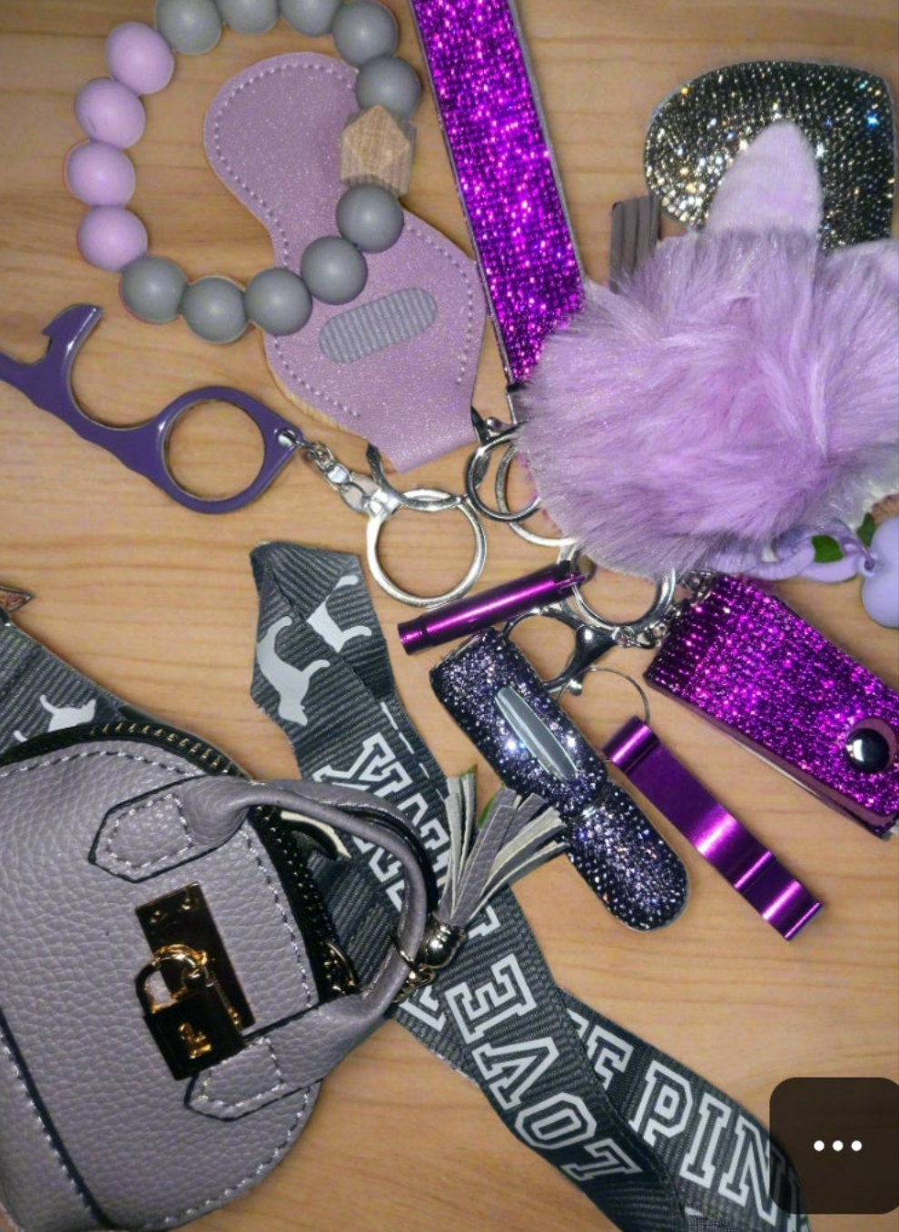 We Don't fit in' BLING KEYCHAIN SET. Includes bag pouch, LPINK Lanyard,  beaded bracelet, totals 15items plus LARGE LUGGAGE