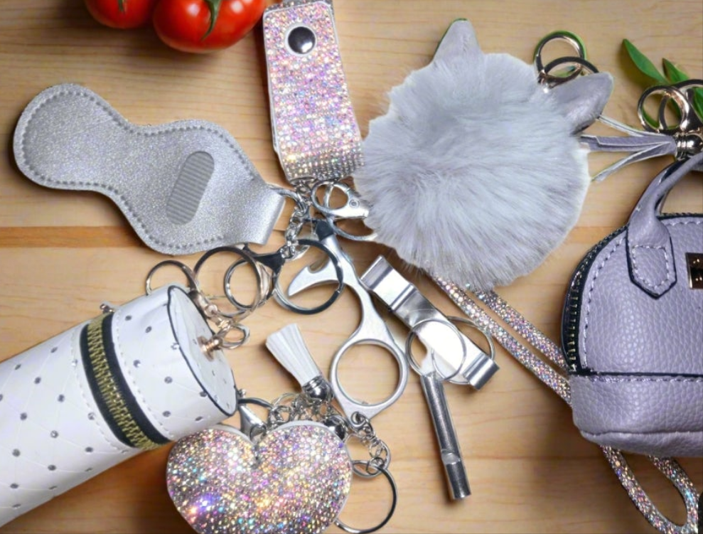 We Don't fit in' BLING KEYCHAIN SET. Includes bag pouch, LPINK Lanyard,  beaded bracelet, totals 15items plus LARGE LUGGAGE