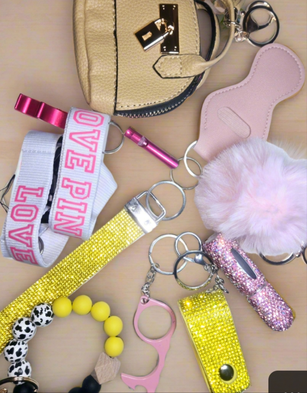 We Don't fit in' BLING KEYCHAIN SET. Includes bag pouch, LPINK Lanyard,  beaded bracelet, totals 15items plus LARGE LUGGAGE