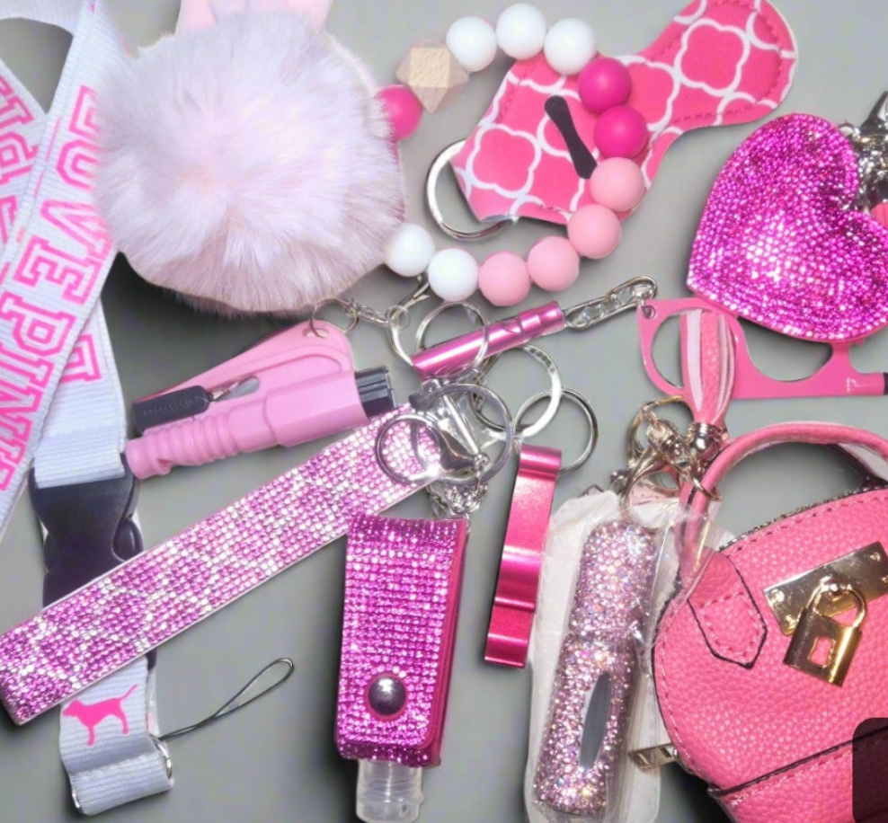 We Don't fit in' BLING KEYCHAIN SET. Includes bag pouch, LPINK Lanyard,  beaded bracelet, totals 15items plus LARGE LUGGAGE