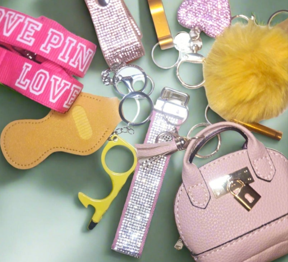 We Don't fit in' BLING KEYCHAIN SET. Includes bag pouch, LPINK Lanyard,  beaded bracelet, totals 15items plus LARGE LUGGAGE