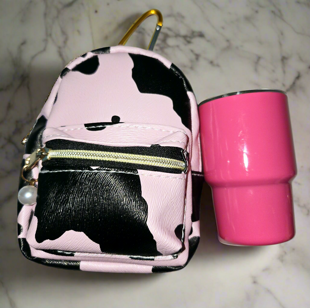 CowGirls Mini, Limited Edition Including this adorable, large mini backpack, keychain purse with a two ounce tumblr, straw with a freebie