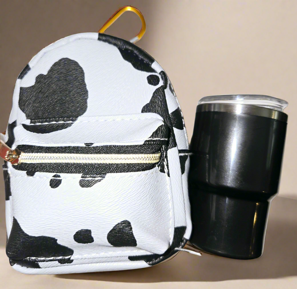 CowGirls Mini, Limited Edition Including this adorable, large mini backpack, keychain purse with a two ounce tumblr, straw with a freebie