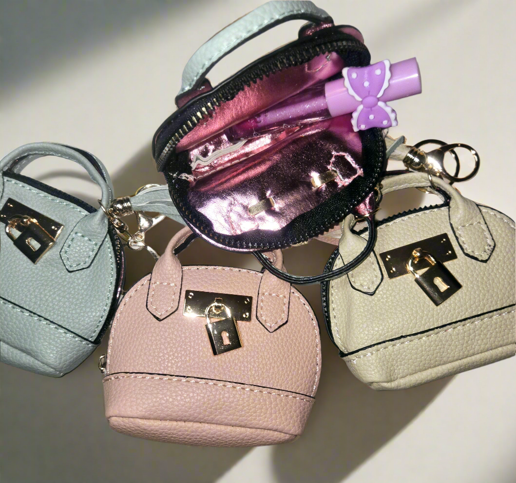 LIMITED EDITION.  MINI LEATHER HANDBAG KEYCHAIN FILL UP!! (5 items)