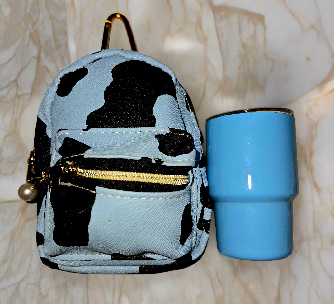 CowGirls Mini, Limited Edition Including this adorable, large mini backpack, keychain purse with a two ounce tumblr, straw with a freebie